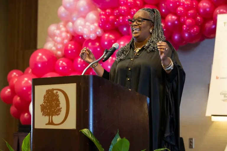 Kim Carter giving a speech.